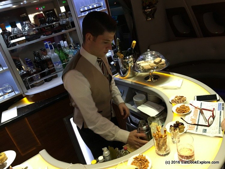 Cesar the Steward manning the Sky Bar in Emirates Business Class