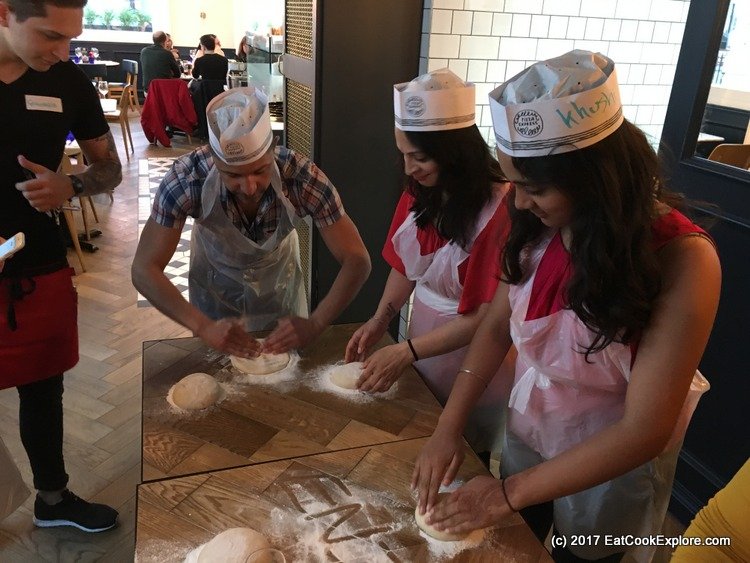 Pizza making party - rolling out the dough